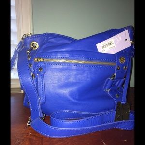 Gorgeous bright blue crossbody w brass detail.